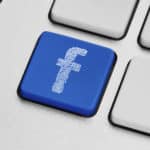 Keyboard with a blue button htat has an F on it; Facebook is launching a new Tv app