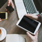 People using iPhones and iPads. closed captioning for iOS technology